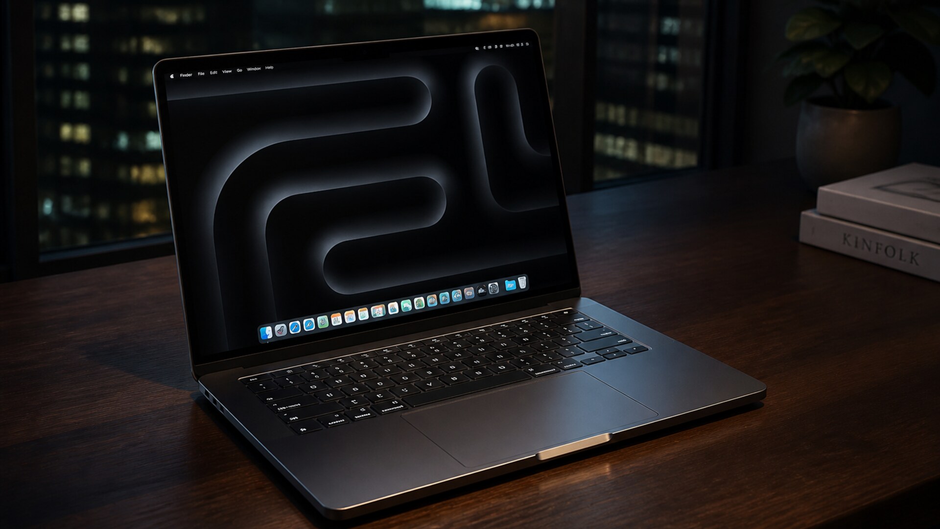 Space Black MacBook Pro on a night desk