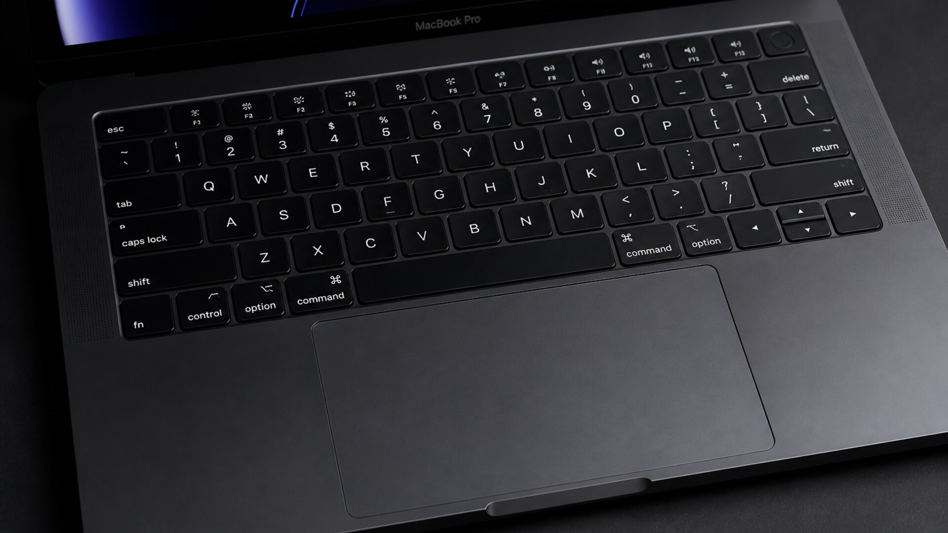 Space Black MacBook Pro keyboard deck